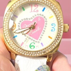 Dooney & Bourke Vintage Gold Watch with White Strap